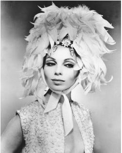 Guy Laroche design, 1965: coq feather bonnet tied with a chiffon kerchief. © AP/Wide World Photos.