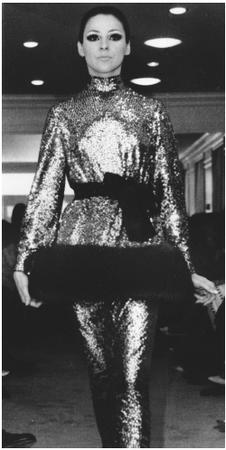 Norman Norell, fall 1968 collection: sequined, fur-trimmed cossack shirt over a narrow skirt. © AP/Wide World Photos.