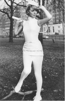 Ted Tinling, 1966 collection: dacron souffle tennis catsuit with a vinyl miniskirt decorated in a racquet motif. © AP/Wide World Photos.